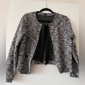 Black and white cardigan with bow closure